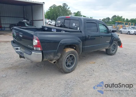 2009 Toyota Tacoma Base V6 z USA, uszkodzony, nr VIN 3TMLU42N69M020233